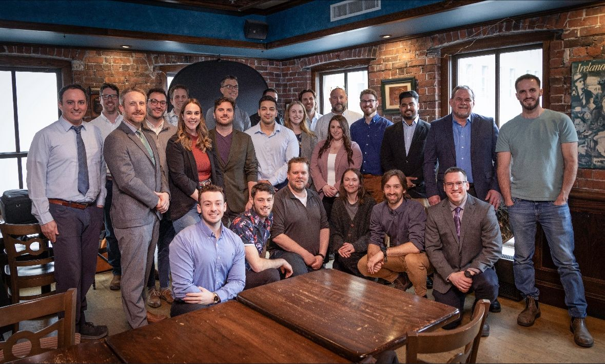 David Brushett with energy management colleagues at a team gathering.